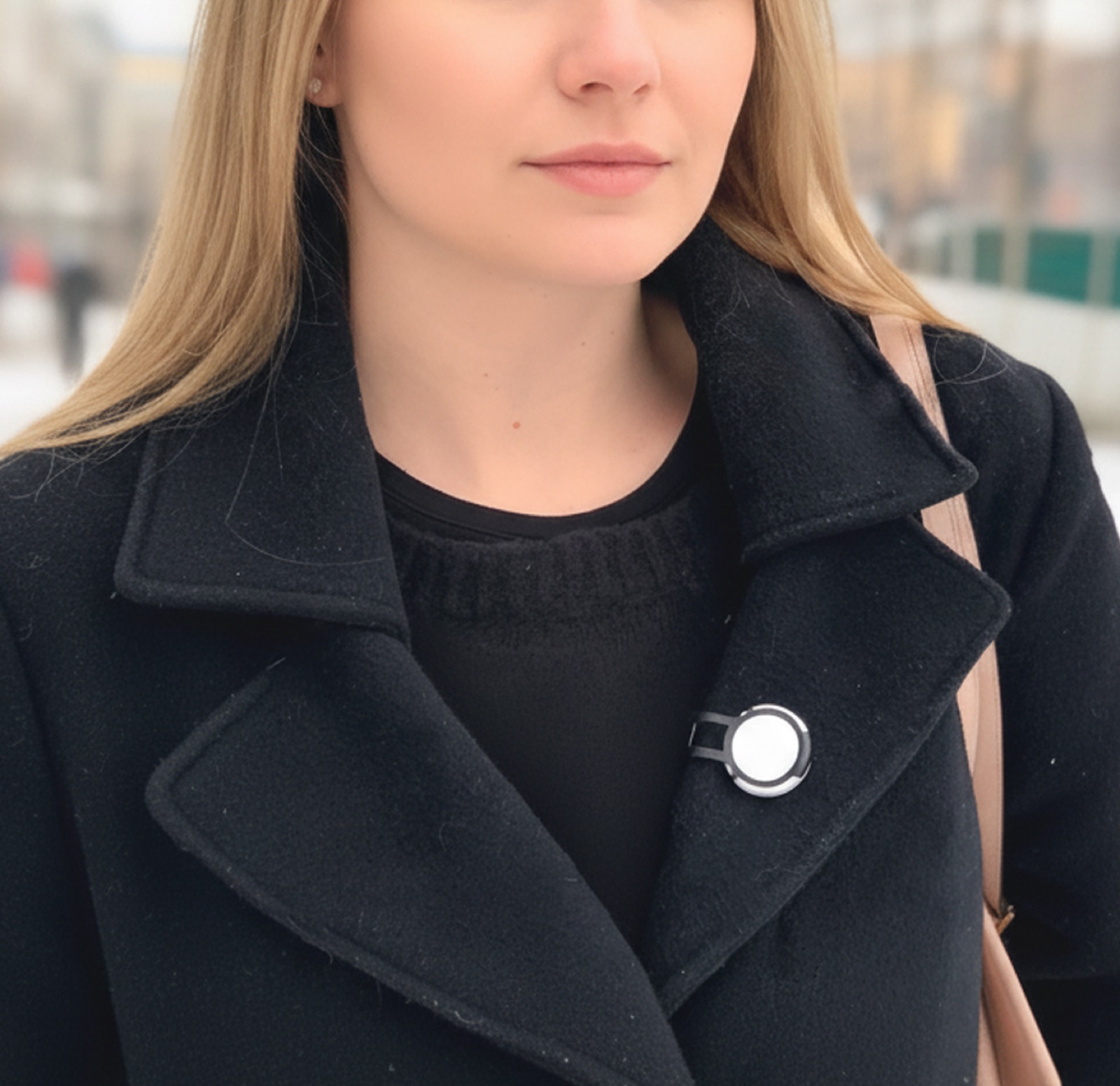 Flic Smart Buttons attaches to clothes or lanyards.